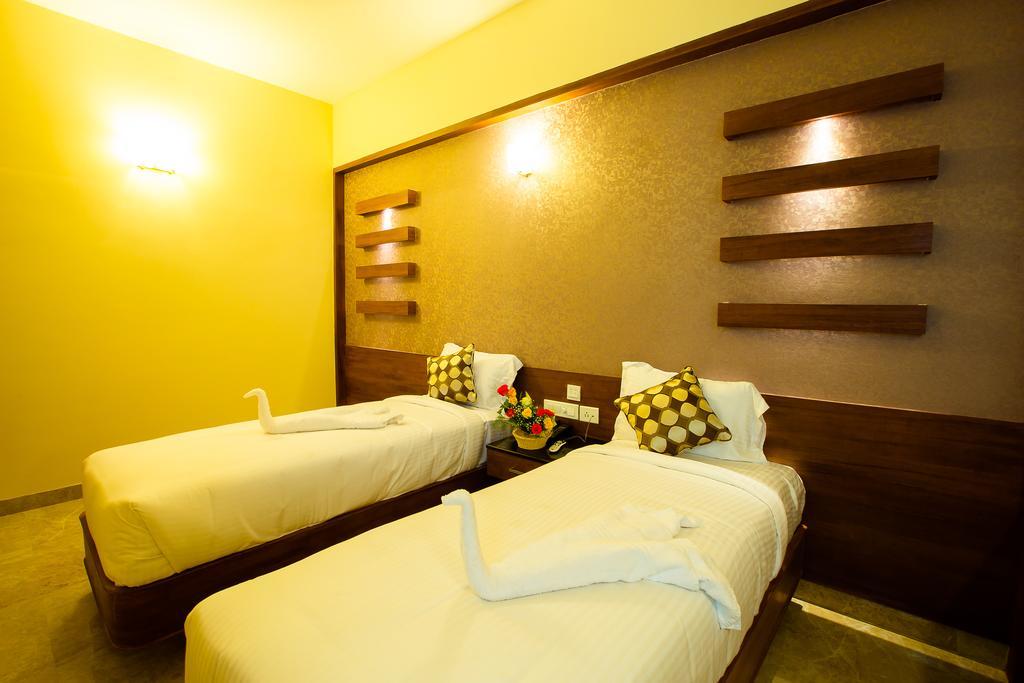 Hotel Radha Prasad Erode Ruang foto
